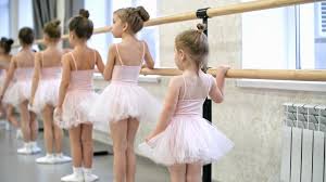 There's no need for special equipment, expensive gym fees, or lots of time. Rear View Of Group Of Little Girls Using Ballet Barre When Doing Leg Stretching Exercises In Dance Studio Stock Video Footage Storyblocks