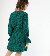 It is made by combining blue and green pigments into a white base. Ax Paris Teal Mixed Animal Print Mini Dress New Look