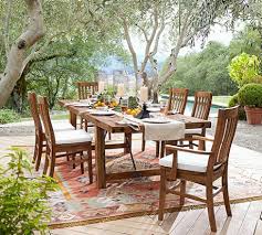 This set includes 2 captain chairs, 2 armless dining chairs, a bench and table that are perfect for entertaining. Perfect Pair Benchwright Outdoor Extending Dining Table Chair Pottery Barn Outdoor Dining Dining Table Chairs Dining Table