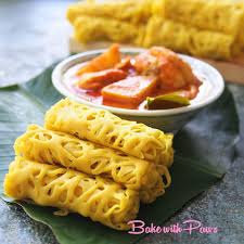 Lay a sheet of aluminium foil on your kitchen surface, close to where you will be. Roti Jala Bake With Paws