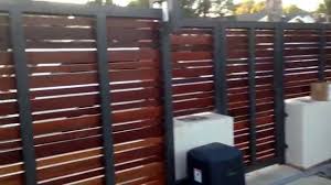 Fences built with metal posts are generally straighter and able to stand up to the wind better. Contemporary Wood Fence And Gate Culver City California Youtube