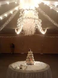Pin By Tyra Dawson On Craft Ideas Hula Hoop Chandelier Wedding Lights Wedding Decorations