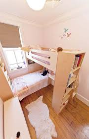 Originally the guest room, this 13' x 9' bedroom is now home to sisters piper, sage and ruby, aged 8, 6 and 3. Two Sisters One Small Room Tiny Kids Room Small Childrens Room Room For Two Kids