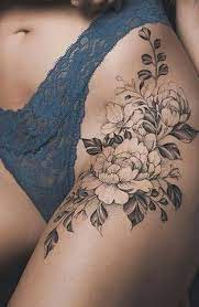 If you want an extra touch of elegance to your flower tattoos, you can put your favorite poem excerpt or quote with the flower as well. 20 Sexy Thigh Tattoos For Women In 2021 The Trend Spotter