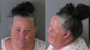 Woman charged in disabled man's assault