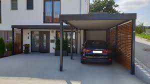 Einzel Carport Aus Stahl Mit Hauseingangsuberdachung Brandl In 2020 Carport Designs Metal Building Homes Building A Pole Barn