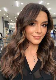 Add some warmth with golden highlights and go for shades like honey to give your complexion a healthy, youthful glow! Hair Color To Look Younger The Best Hair Color Tips To Look Younger Who What Wear They Cover Forehead Wrinkles Can Make Hair Appear Fuller And They Have A Youthful