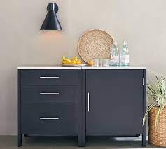 Summer is the time for backyard bbq's and the best outdoor kitchens are as functional as an indoor kitchen, as welcoming as a living room, and as entertaining as a family room. Malibu Metal Outdoor Kitchen 3 Drawer Single Door Cabinet Black Pottery Barn