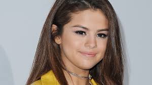 Separate the main part of your bangs from the side bits, in the front. Selena Gomez Just Got Side Swept Bangs Stylecaster