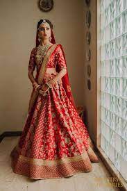 Photo Of Red And Gold Bridal Lehenga With Floral Work Embroidery Bridal Lehenga Collection Indian Bride Outfits Indian Bridal Outfits