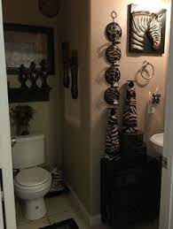 Go for a wholly thematic approach, or work subtle safari elements into your decor with leopard rugs, bold artwork, and fierce furnishings. 29 Safari Bathroom Ideas Safari Bathroom Animal Print Decor African Decor