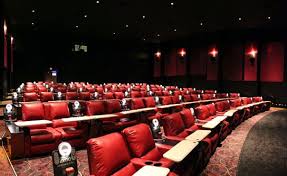 Dinner Movie Theaters Pictured Here In One Of The Larger Halls At The Amc Dine In Theatre Dine In Theater Amc Theatre Pictures