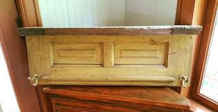 With the addition of a few hooks to hold the ironing board and a shelf to hold the iron, this old door quickly becomes a permanent holding station for your ironing board and iron. 42 Rustic Ways To Decorate With Old Doors Home And Garden