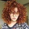 This is one of the modern short haircuts for curly hair. 3