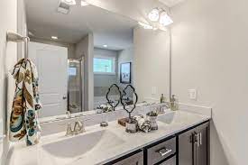 Floors are leonia gray tile. New Home Bathrooms Photos Caviness Cates Communities