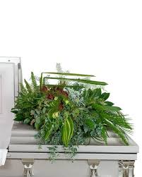 Flora funeral is here to help you provides a personalized expression of condolences during difficult times of loss. Beloved Botanics Casket Spray In Harrisonburg Va Blakemore S Flowers