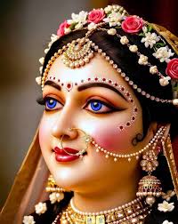 Which is very beautifully decorated by the circle of Radha's friends, who  display a wonderful variety of beautiful bodily complexions, who are  wonderful with the beauty and charm of splendid youth, who