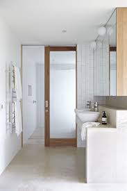 The frosted glass gives a subdued view of your things and creates a more spacious feeling compared to solid panels. Gb Honed Porcelain Sliding Door Design Frosted Glass Door Bathroom Design