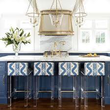 At a minimum, an island adds counter and storage space just where you need them: Brass And Lucite Kitchen Island Legs Design Ideas