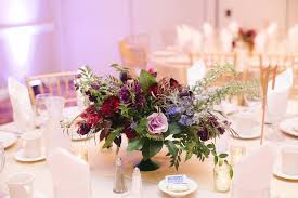 Go for a bold arrangement with oversized flowers, such as amaryllis. Jewel Tones For Fall Pollen And Pastry Chicago Weddings Pollen And Pastry