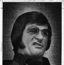 Bob "Li'l Elvis" Harrison, who has a large following of fans due to his  Elvis-like singing, producing an Elvis-like scowl — Calisphere