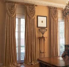 Use this window nook to mix a drink and then kick back and enjoy this classy place to relax. Curtain Ideas For Bay Windows In Living Room Traditional Living Room Big Window Curtains Brow Curtains Living Room Brown Living Room Decor Traditional Curtains