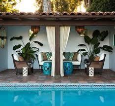 Your pool, landscaping, patio furniture and more help set the tone of your backyard, so we hope you use these ideas as inspiration for creating an outdoor living room that fits your needs and style. 19 Best Pool Area Decorating Ideas Outdoor Rooms Pool Area Decorating Ideas Outdoor Living