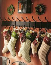 Christmas stockings are traditionally placed near a fireplace, although some people place them under their christmas tree or hang them on the end of their bed. 12 Alternative Ways To Display Christmas Stockings No Fireplace Needed Hanging Christmas Stockings Christmas Stockings Hanging Stockings