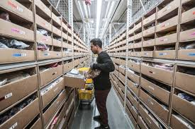 Inside An Amazon Warehouse In The Final Days Before Christmas The enormous warehouse covers 500,000 sq ft, the equivalent of seven football pitches, and. the desert sun