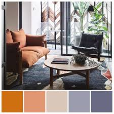 A Subtle Contrasting Colour Scheme Featuring Orange And Greyed Blue Suits The Soph Interior Design Color Schemes Living Room Color Schemes Grey Interior Design