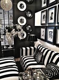 Love The Combination Of Bold Stripes Round Mirros And Square Frames With A Hint Of Silver Sparkle I White Home Decor Black And White Living Room White Decor