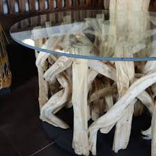 There is a wide range of designs of glass top dining tables in almost every price range. Table Basse Ronde En Verre Et Bois Flotte Cdiscount Maison