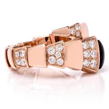 What kind of balloons are in rose gold? Bvlgari Serpenti Diamond Onyx 18 Karat Rose Gold Ring At 1stdibs