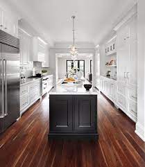 I love the color palette of the modern farmhouse kitchen, yoon says. Black And White 45 Sensational Kitchens To Inspire Galley Kitchen Design Black Kitchen Island Kitchen Design
