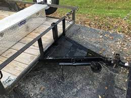 Welded Swing Stand Metal Mesh For Work Surface And A Trailer Hitch Vertical For Transporting Telephone Poles Or Other Really Lon Metal Mesh Work Surface Metal