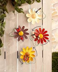 This plant pot stand is. Flower Garden Wall Spinners Garden Wall Metal Flowers Diy Garden Projects