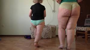 Chubby milfs do a charge at home, shake their big asses, waving thick feet  in socks, and air their hairy cunt. - XNXX.COM