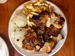 Place in a large bowl and season generously with beer, vinegar, lime juice, salt, garlic powder, cumin and oregano. I Ate Peruvian Rotisserie Chicken With Fries And Rice Food