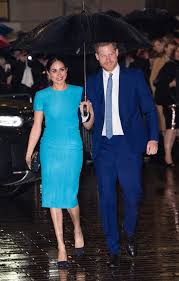 Meghan markle looked every inch a princess when she and prince harry made their because of the frenzy, they've decided to rename the coat the meghan in markle's honor. Meghan Markle And Prince Harry Wear Matching Blue Looks In London Insider