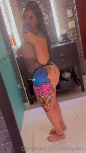 RiskyDon flaunts her massive breasts and juicy butt for the camera