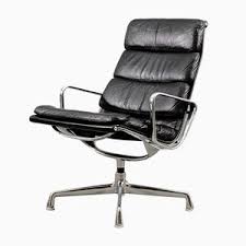 In addition to the smaller size, this version does not have the file drawer that the larger. Buy Office Chairs By Charles Ray Eames At Pamono