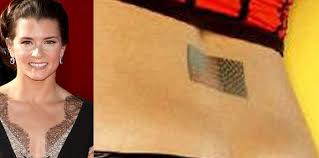 Some photos released left our eye sockets to be quite red, as danica's lower back american flag tattoo was exposed. Danica Patrick Tattoos