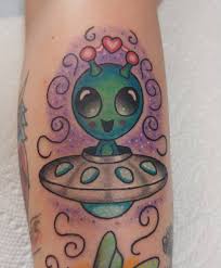 Green ink cute alien tattoo on leg. Updated 50 Out Of This World Alien Tattoos August 2020