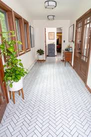 Plus, an entryway is the first impression guests have of your home, so you want it looking fresh and sharp. Entryway With Handmade Tile Floor In Herringbone Fireclay Tile