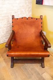This Beautiful Miguelito Or Butaque Chair Is Handcrafted In Mexico It Is Made From Pine Wood Calfskin And A Mexican Chairs Mexican Crafts Mexican Designs