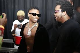 By using this site, you. Photos Wizkid And Olamide Spark Joint Performance Speculation As They Arrive Livespot X Festival Together