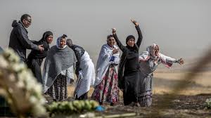 'i saw body parts being taken in white bags'ethiopian airlines crash: Grieving Families Given Earth From Ethiopian Crash Site Loop News