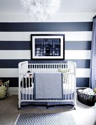 Baby boy nursery theme ideas. 11 Gorgeous Ways To Use Wallpaper In Your Nursery Alphadorable Custom Nursery Art And Decor Striped Walls Nursery Striped Walls Bedroom Nursery Wallpaper Boy