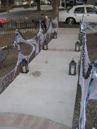 Halloween yard decorating rivals the excitement felt at christmas for many, including the candy seeking. Quick Easy Haunted Stanchions Solved My Need For A Lot Of Fencing Outdoor Halloween Parties Halloween Outdoor Decorations Halloween Diy Outdoor