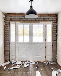 Some people prefer the old traditional farmhouse look, whereas some want to make their exteriors look here, the sliding barn doors have been use to achieve country vibes in modern interiors. Installing Farmhouse Double Dutch Exterior Doors Lolly Jane